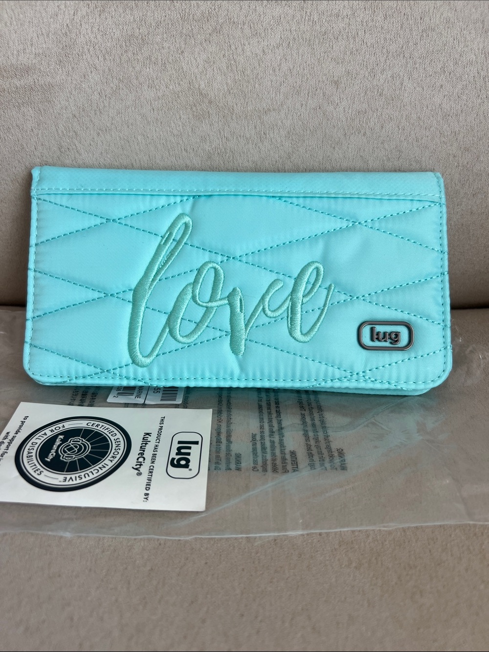 NWT Lug Sweep Slim Flap Wallet in Aquamarine